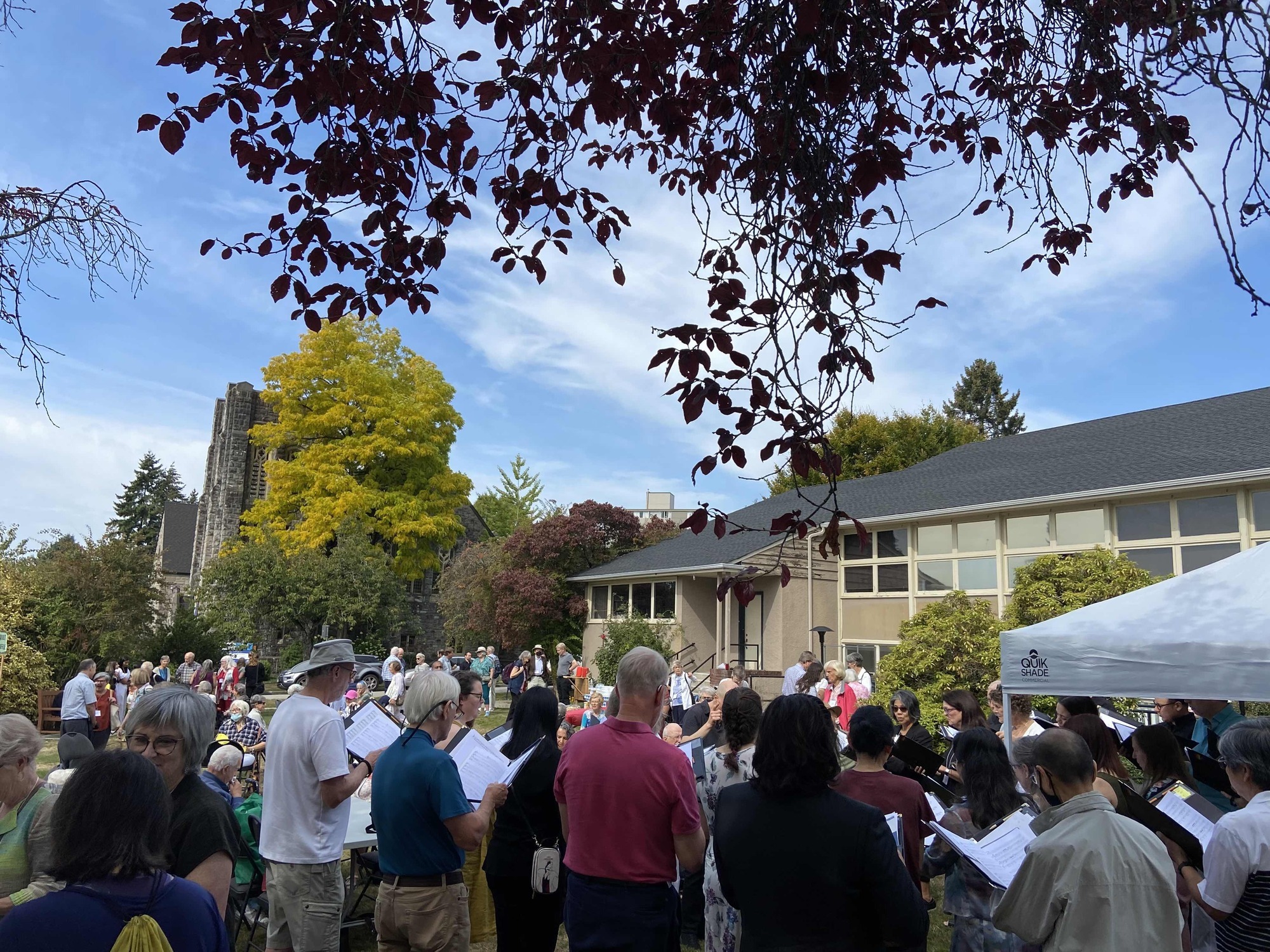 Church community gathered on the lawn